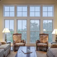 living room of a home with a window and two chairs