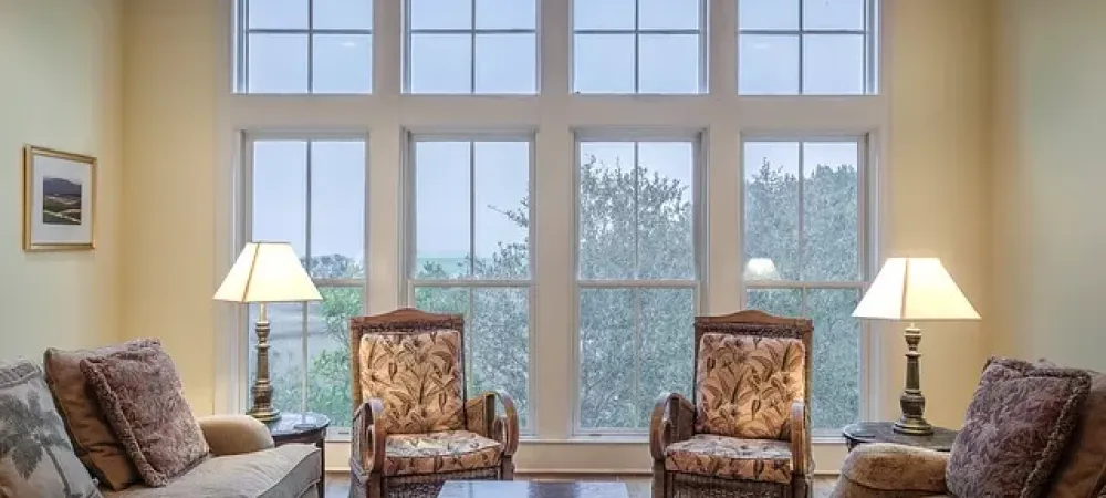 living room of a home with a window and two chairs
